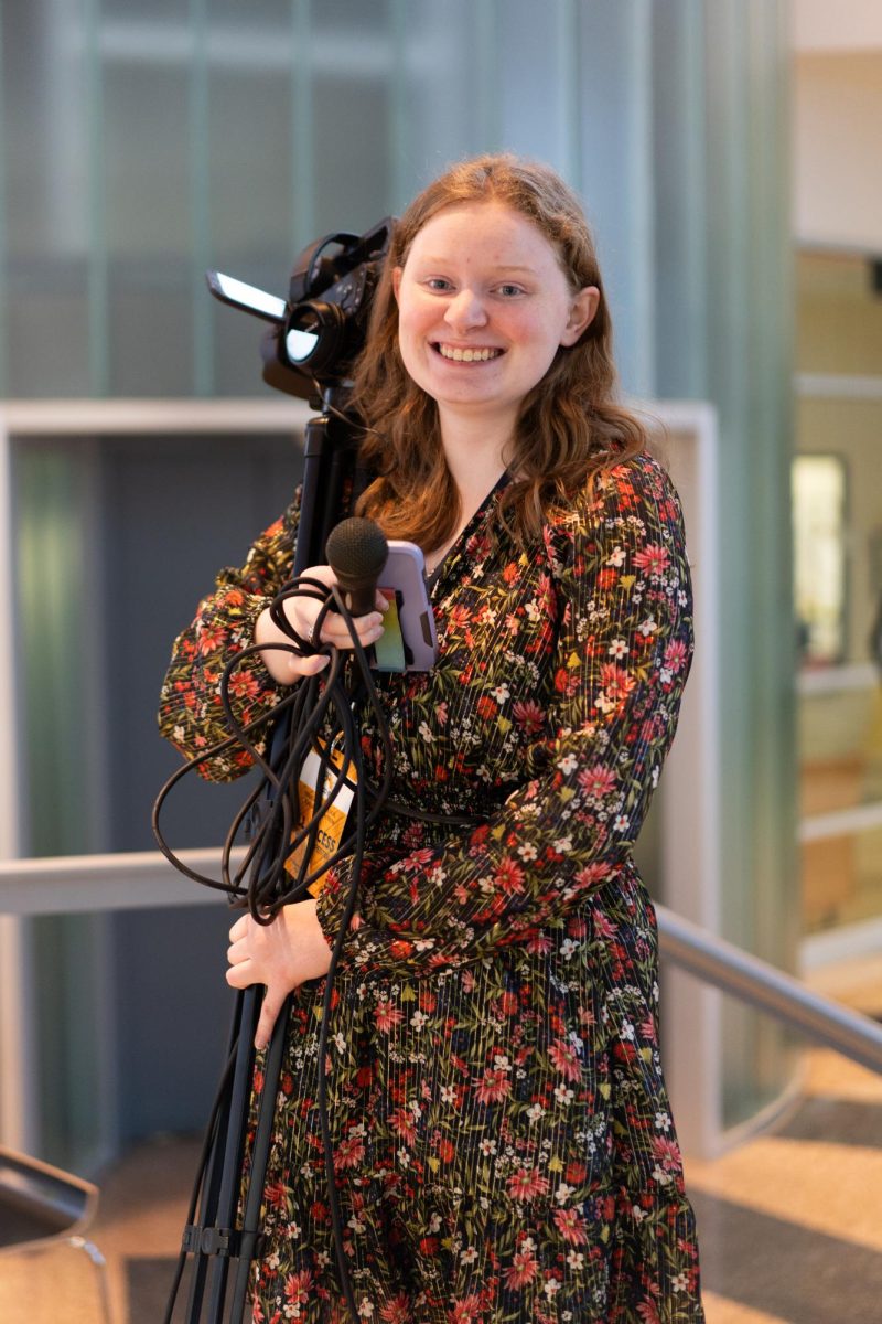 Isabelle Smith filming b-roll during onsite competition.