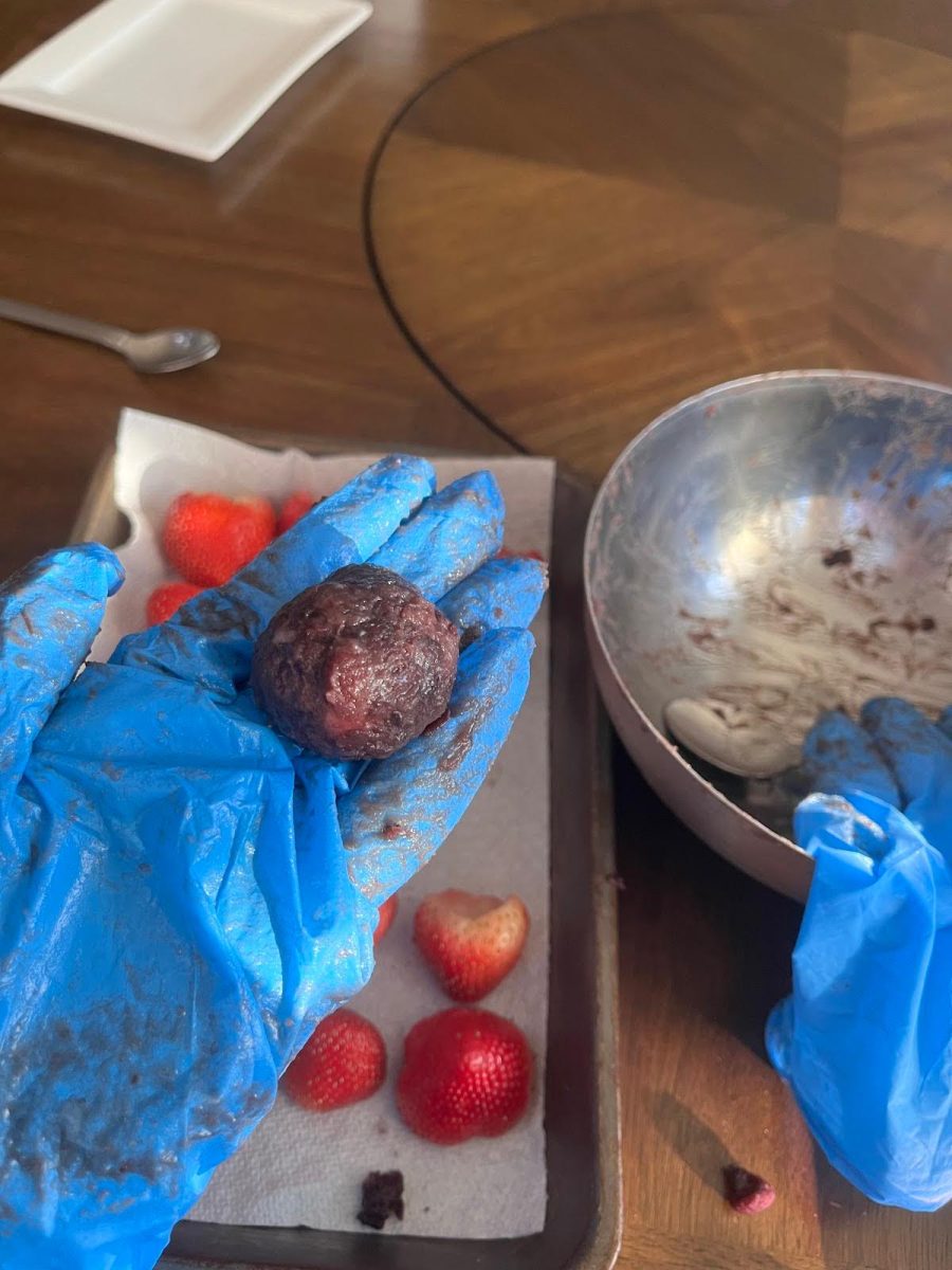 Step 4: Wrap strawberry into the paste.