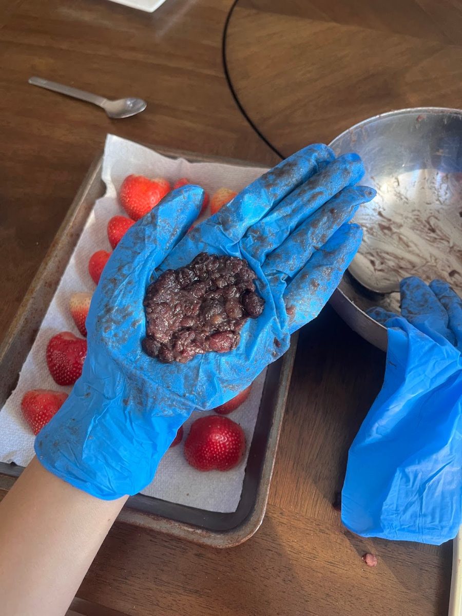 Step 4: Wrap strawberry into the paste.