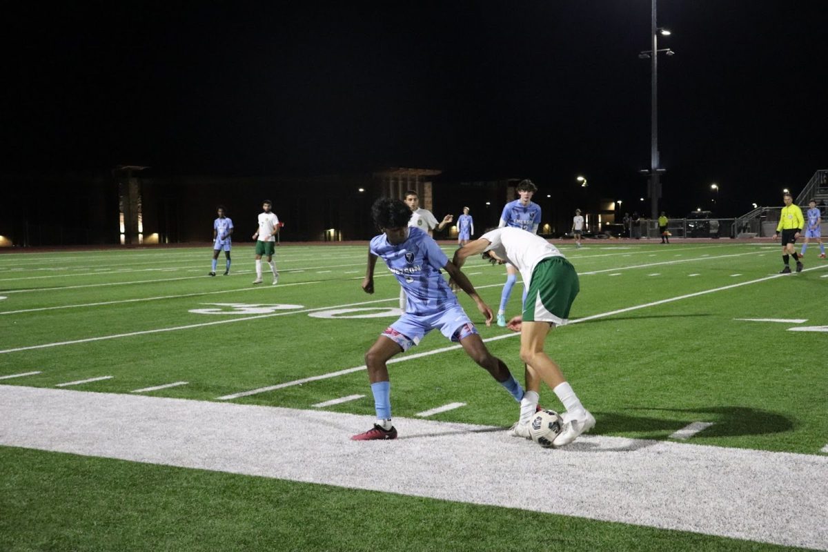 Sophomore Abhiram Gardas contests the ball to prevent the opponent from scoring.