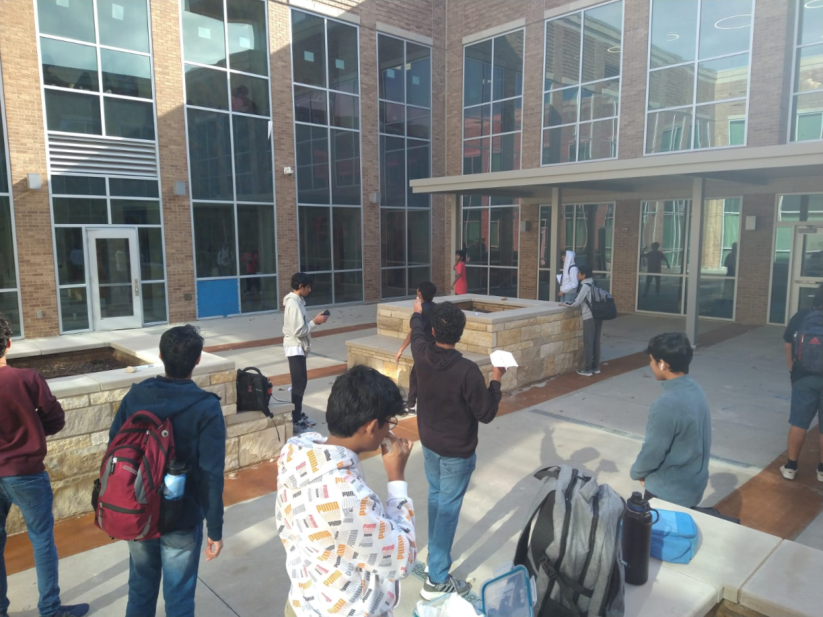 ARC holds a meeting in the courtyard to go over aerodynamics. 