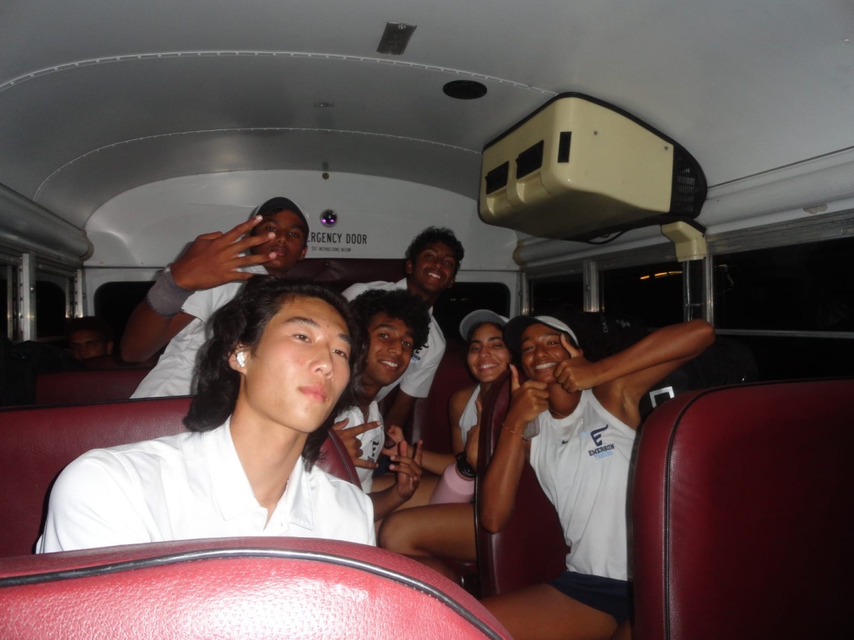 The Maverick Tennis team commemorate a tournament on the bus ride home.