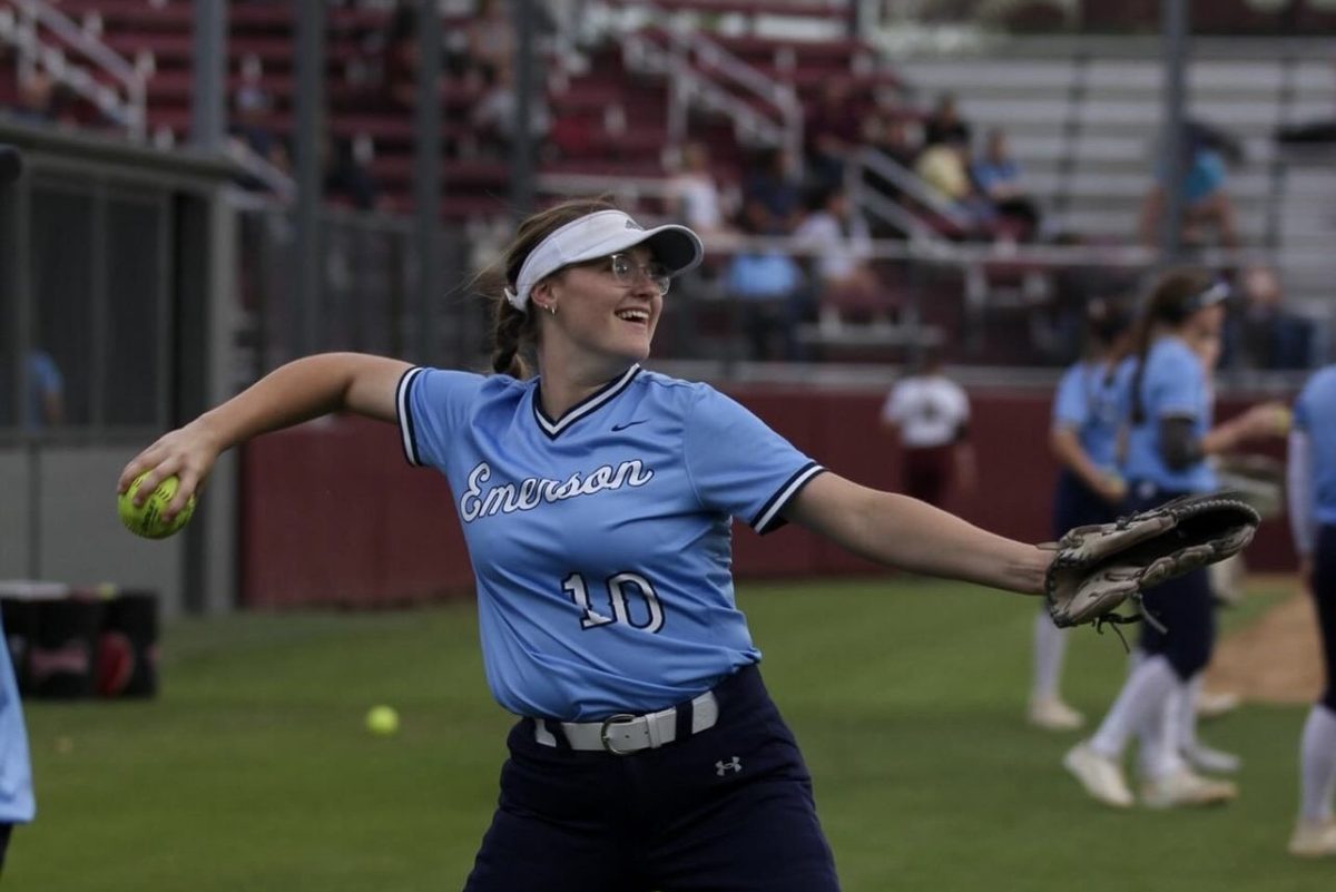 Addison Hudnall, 11, practices her pitch during the Heritage game.