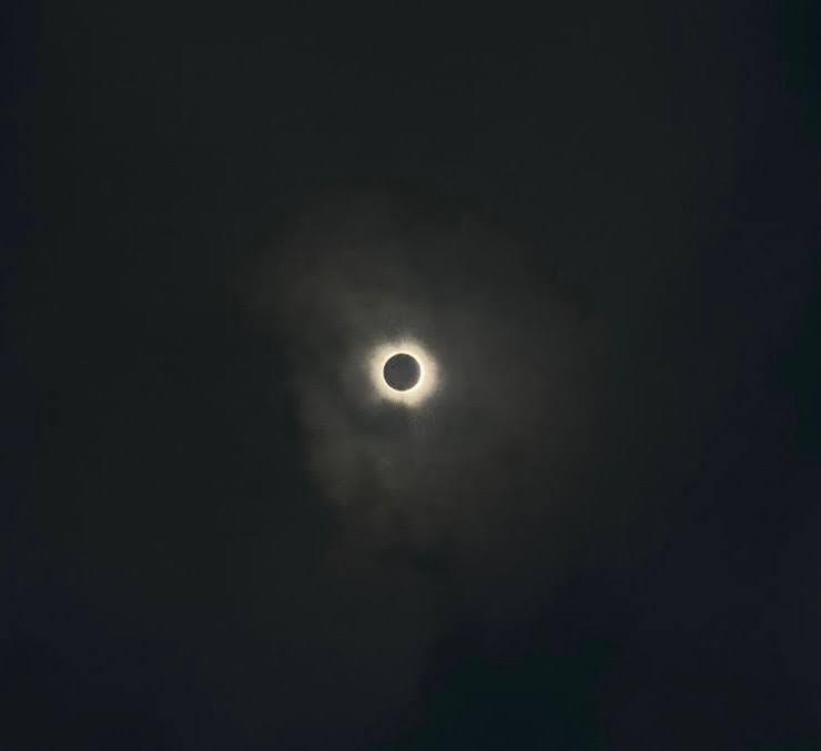 The eclipse reaching totality around 1:42 pm.