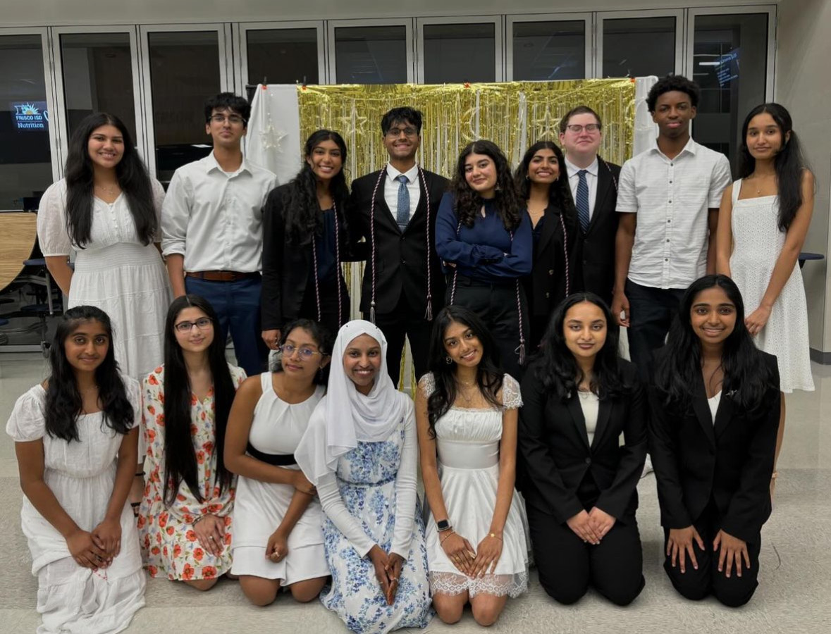 The debate team poses for one final group photo