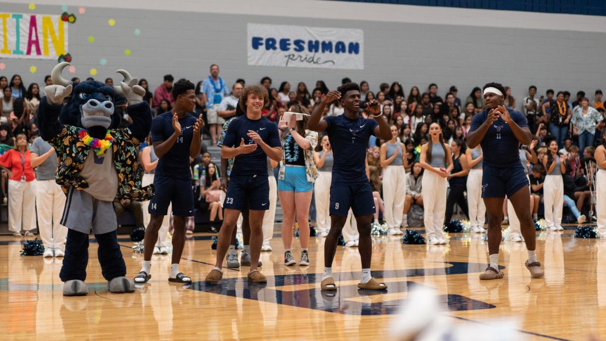 Christian Lyons, 12; Kelton Wafer, 12;  Nate Leal, 12; and Agape Lawrence, 12 hype up the crowd in anticipation for the Aug. 29 game against McKinney.