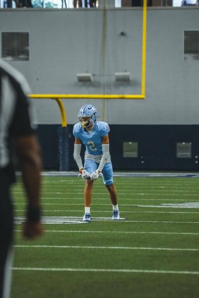 Wide receiver, Blake McLane, 11, gears up for the first play.