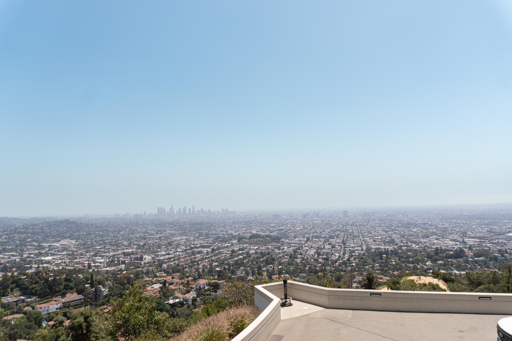 Los Angeles’ overall city view from above features an interplay of urban scenery and mountainous areas. 