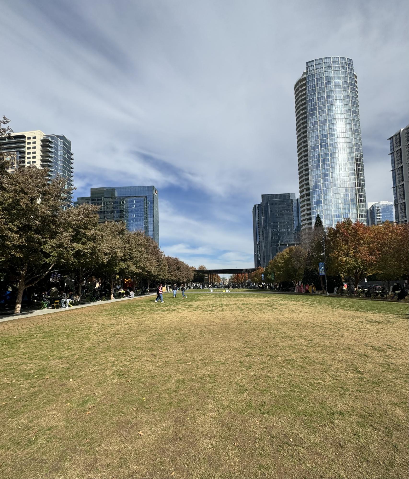 Klyde Warren Park view mixed with Dallas city view in front of DMA.