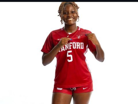 Young poses in her new Stanford University soccer jersey.