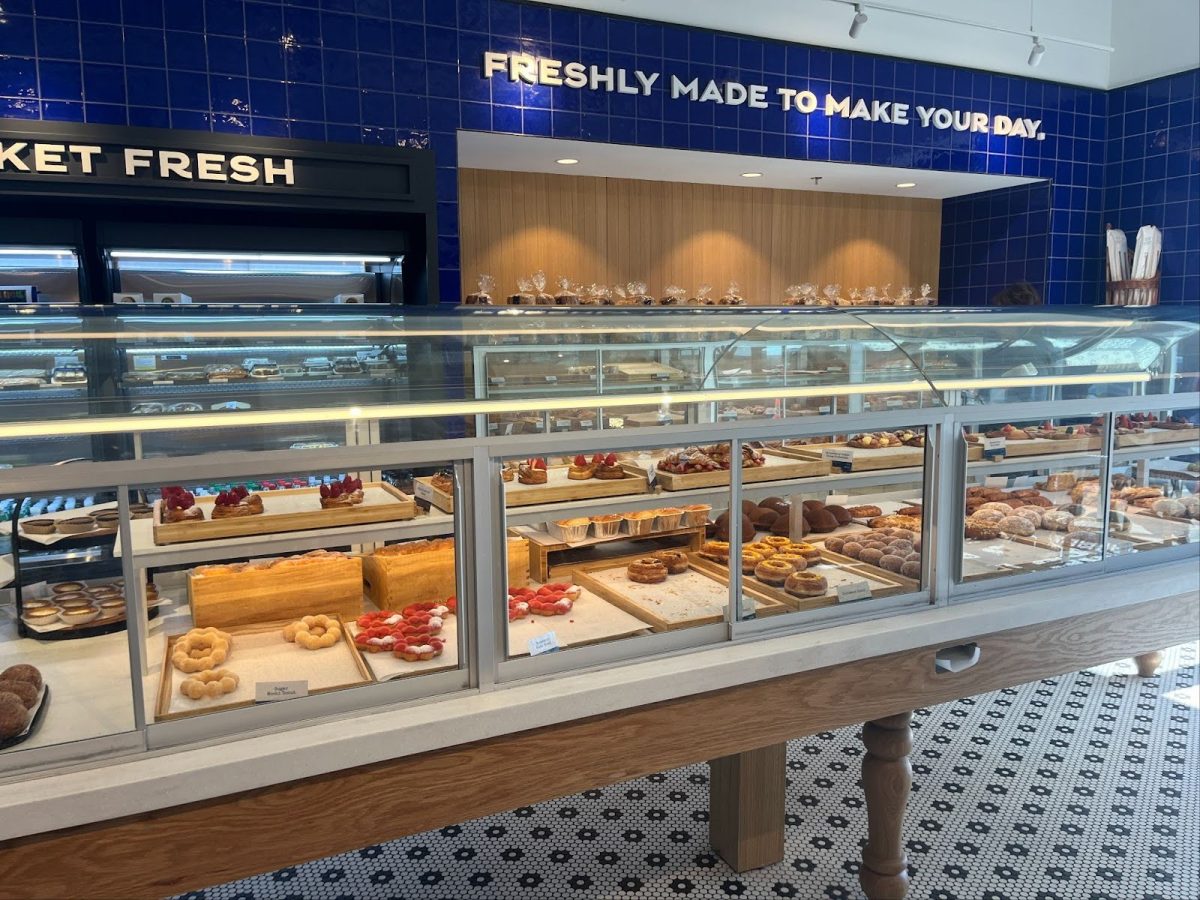 On the right side of the shop, display cases with sliding doors feature bakery items that customers can pick out using a pair of provided tongs and bring to the counter for purchase.