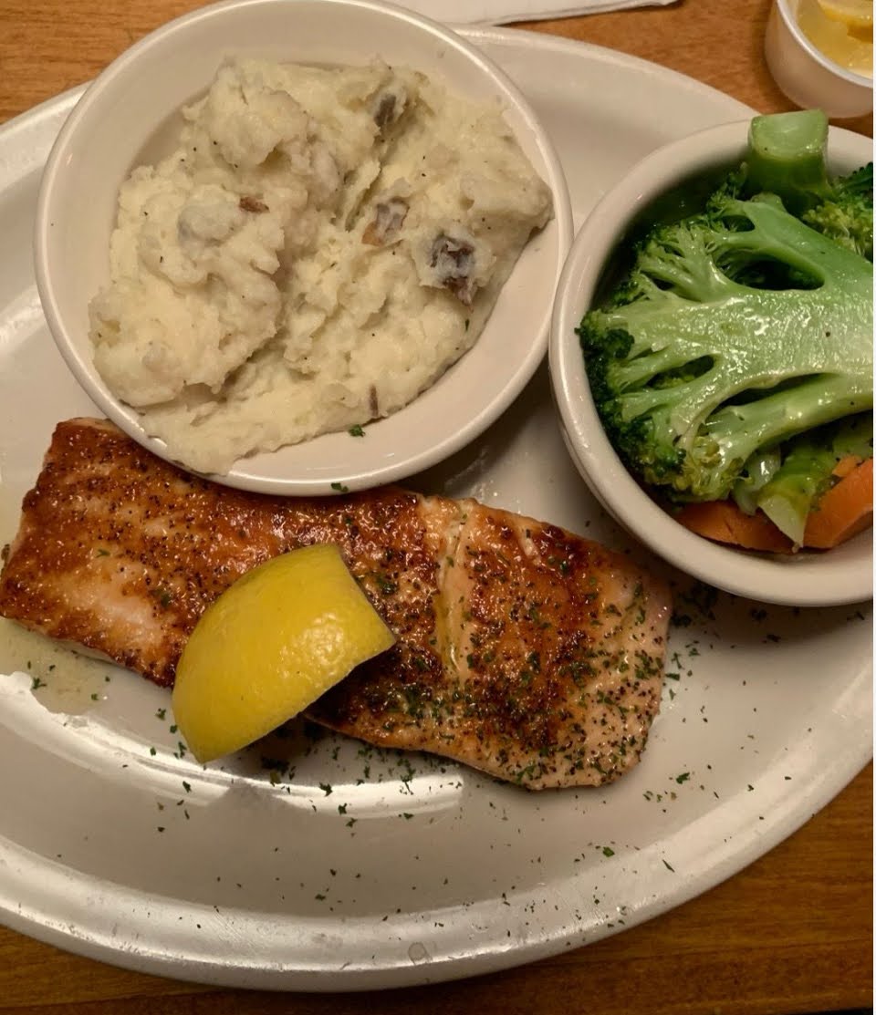 Grilled Salmon with side of mashed potatoes and mixed vegetables from Texas Roadhouse. (@connordevoured)