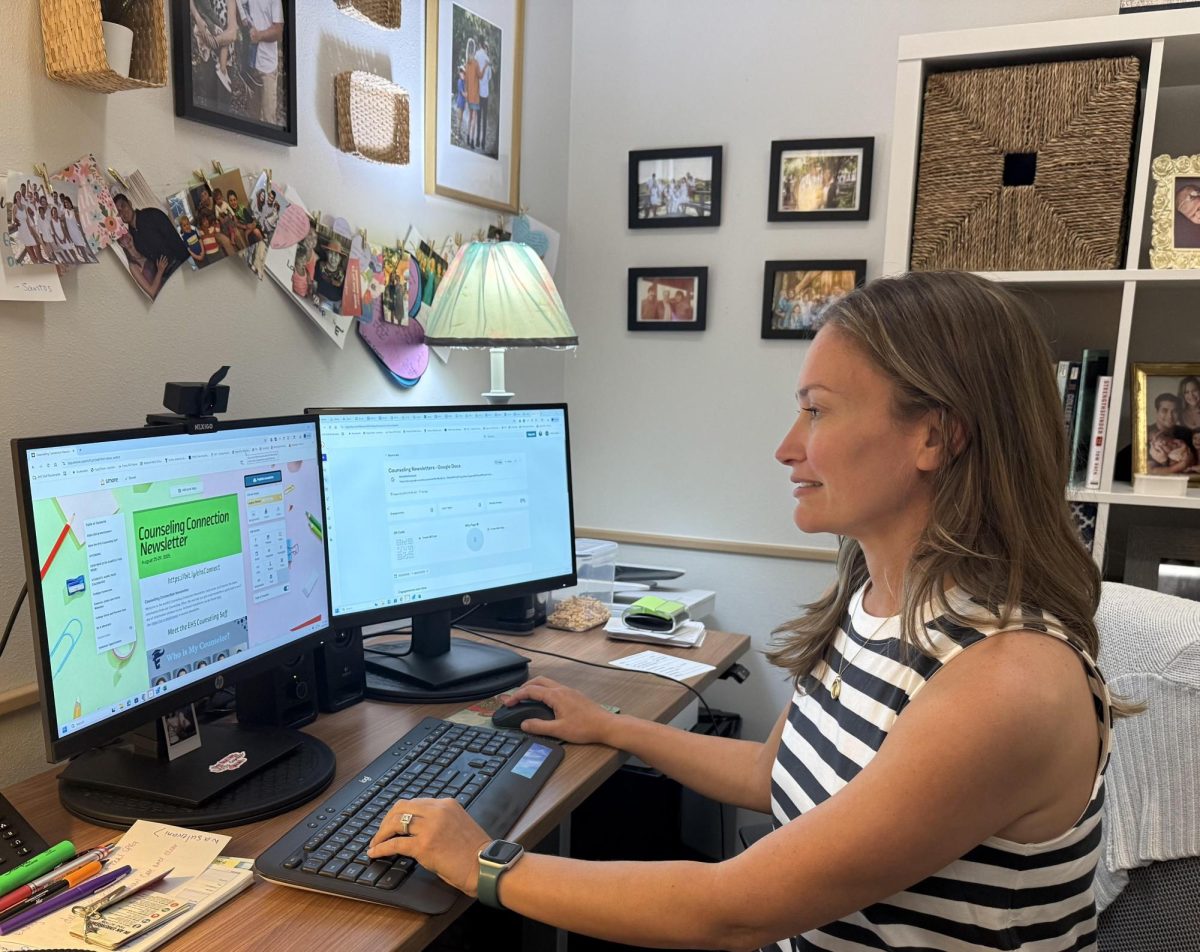 Leigh Casares sits at her desk in her office