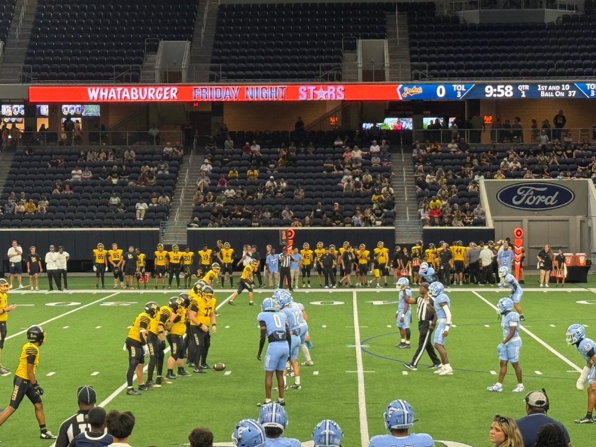 Emerson’s defense lines up for Denison's play. 