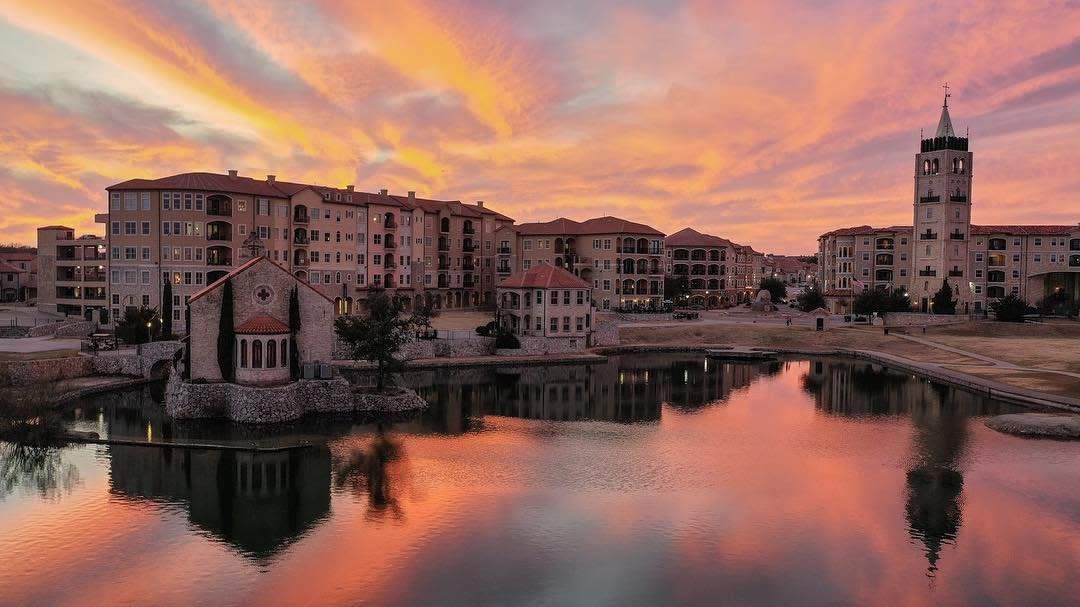 View of Adriatica Village during a sunset 