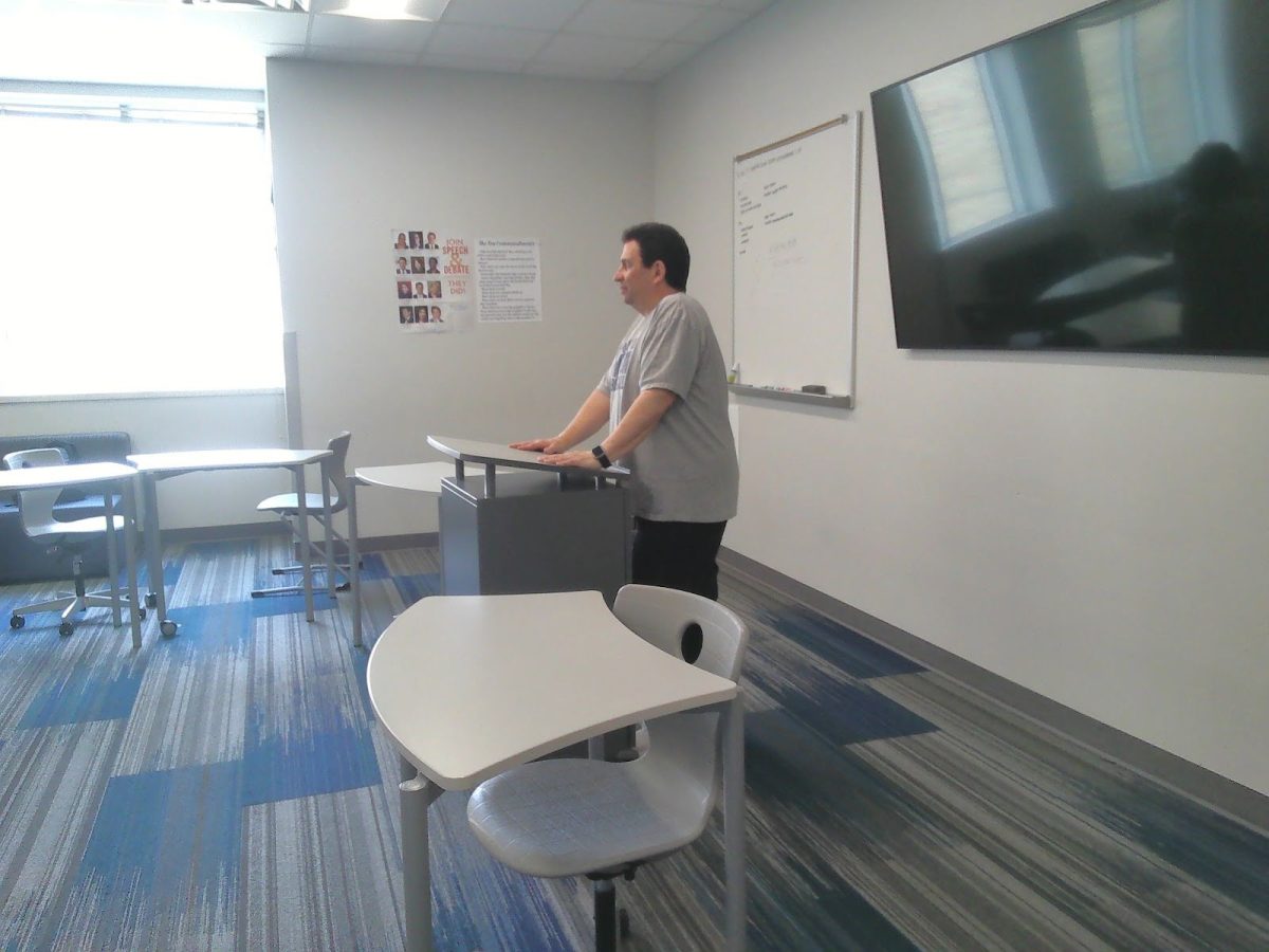 Michael Herman gives a thoughtful presentation to students on what problems need to be addressed.