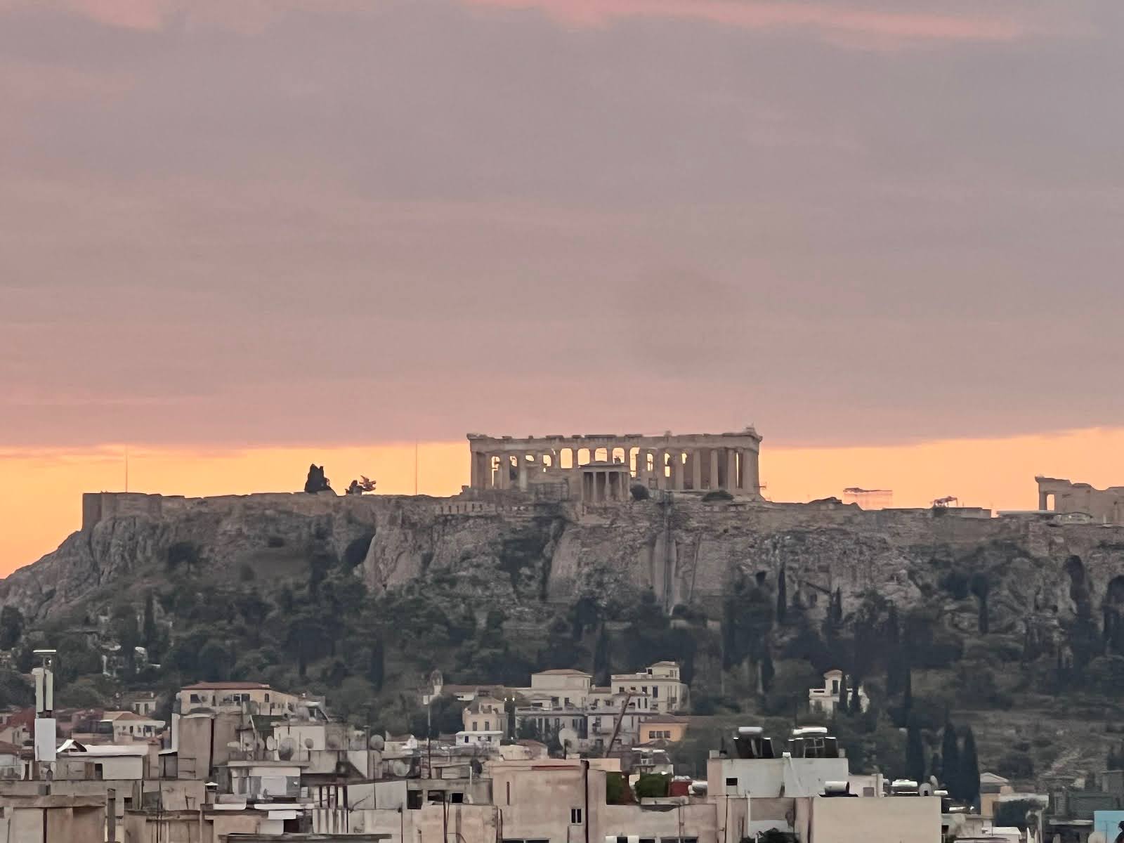 View of the Parthenon illuminated with the sunrise