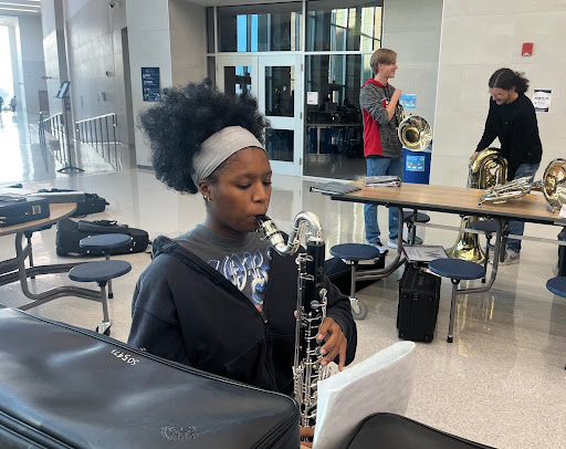 Kirsten Smith, 12, playing her bass clarinet before her audition.