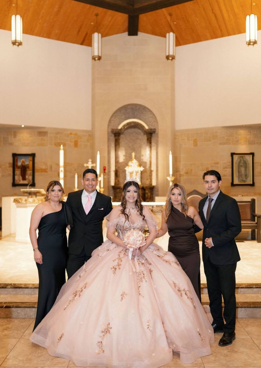 The tradition of the mass for the Quinceañera. Julia Hernandez, Manuel Hernandez, Camila Hernandez, Blanca Lopez and Juan Lopez. (Ivan Sierra Photography)