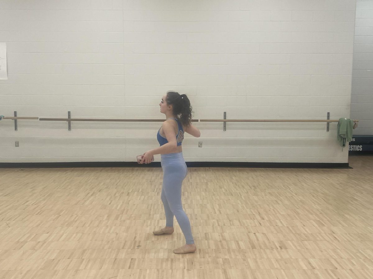 Callie Petty, 12, practices her solo to ensure she's ready for competition.
