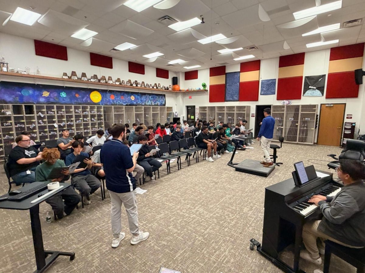 Choir students and directors from across the district rehearsing after school. (Christopher Rhodes)